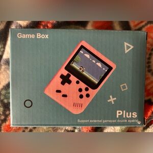 Game Box Plus handheld game console.